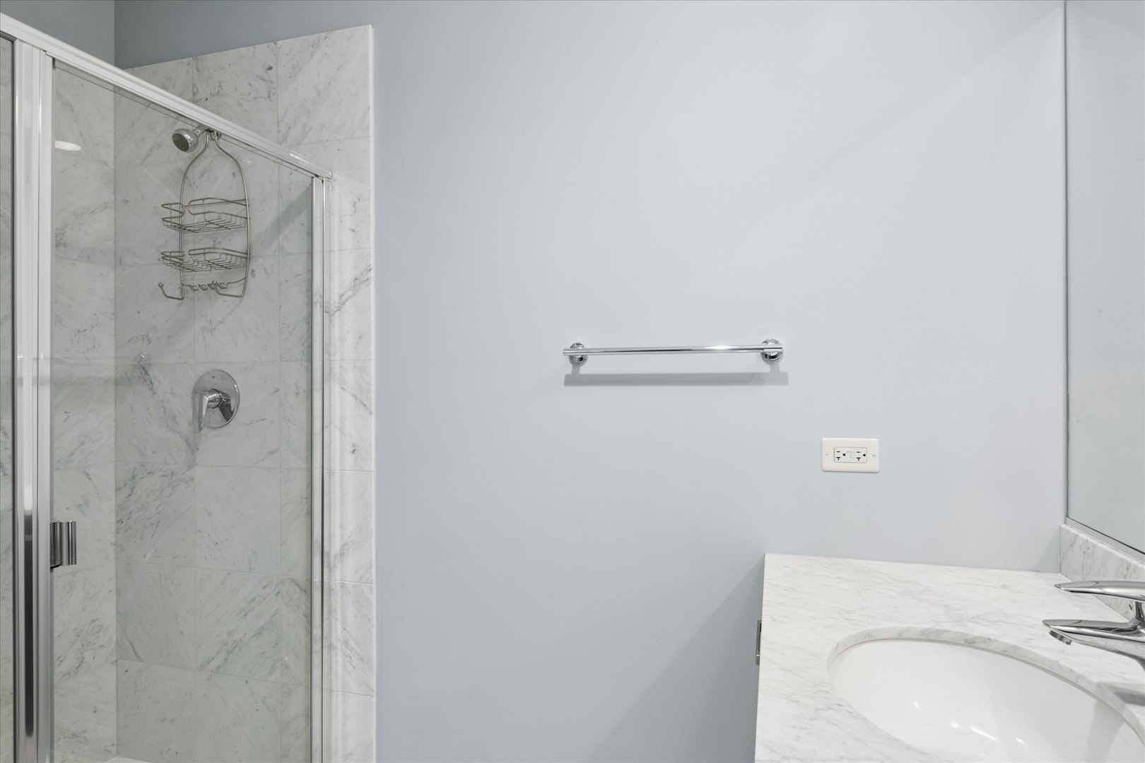 65 East Monroe Street, Unit 4521 Chicago, IL 60603 - Photo 11 of 25 a bathroom with a sink a toilet and shower