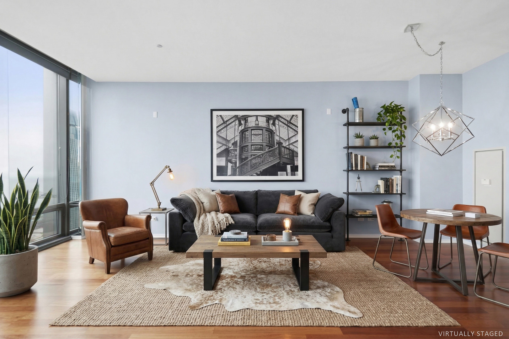 65 East Monroe Street, Unit 4521 Chicago, IL 60603 - Photo 3 of 25 a living room with furniture a rug and a chandelier