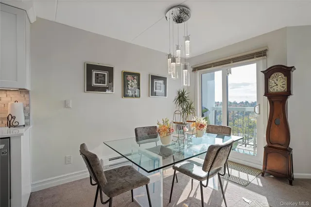 a view of a hallway with paintings on the wall