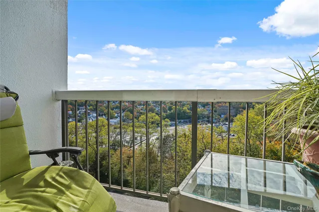 a living room with furniture and a lamp