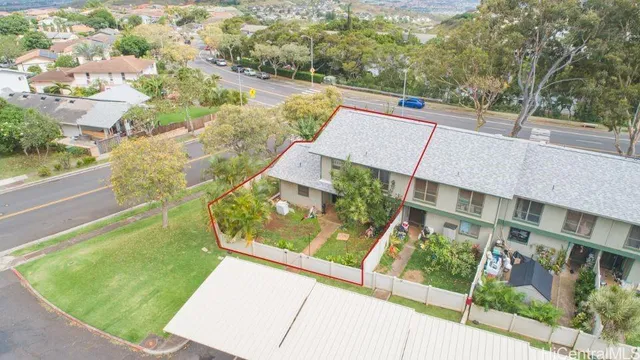 a view of a yard with an outdoor seating