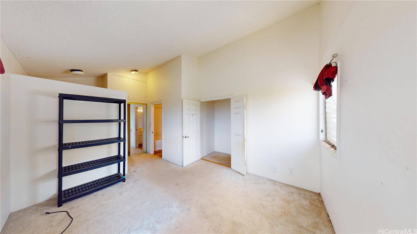 92-1244 Kikaha Street, Unit 14 Kapolei, HI 96707 - Photo 11 of 25 a view of empty room with front door