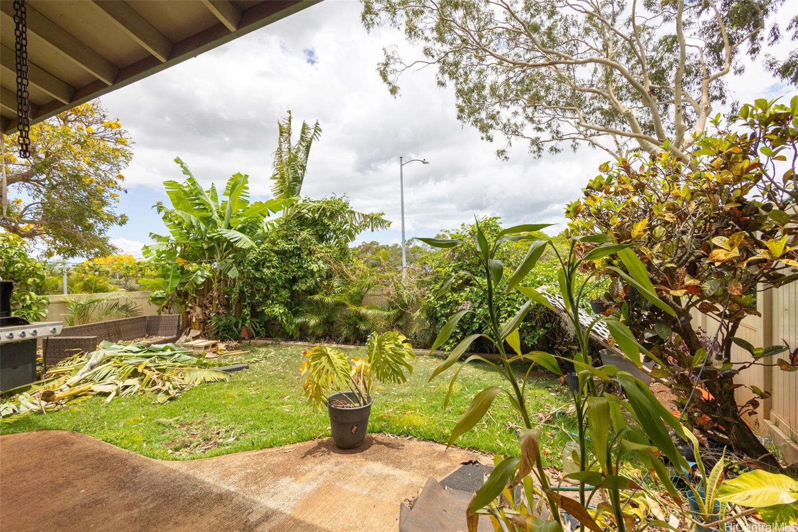 92-1244 Kikaha Street, Unit 14 Kapolei, HI 96707 - Photo 19 of 25 a view of a swimming pool with an outdoor space