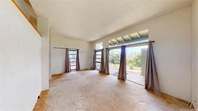 a view of a big room with large windows