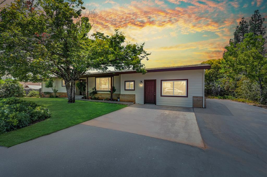 1333 Wesley Lane Auburn, CA 95603 - Photo 2 of 35 a view of a house with a yard and large tree