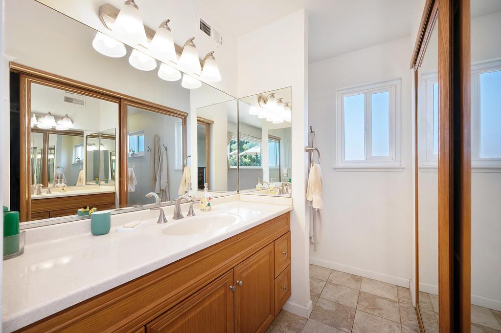 1333 Wesley Lane Auburn, CA 95603 - Photo 21 of 35 a bathroom with a sink mirror and vanity