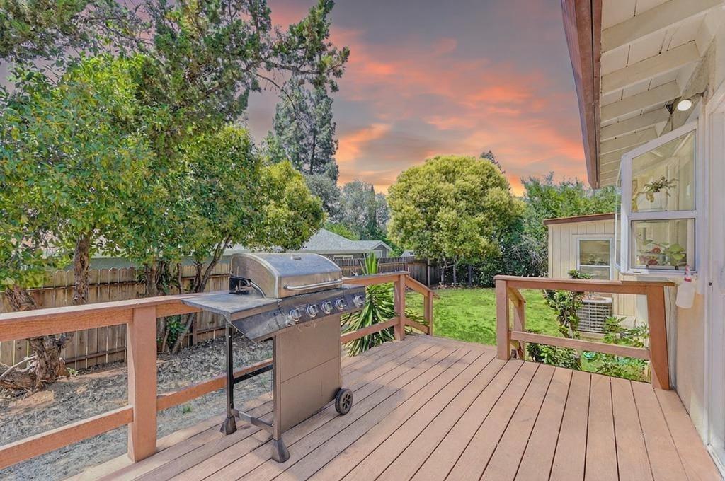 1333 Wesley Lane Auburn, CA 95603 - Photo 31 of 35 a view of a deck with chairs and wooden floor