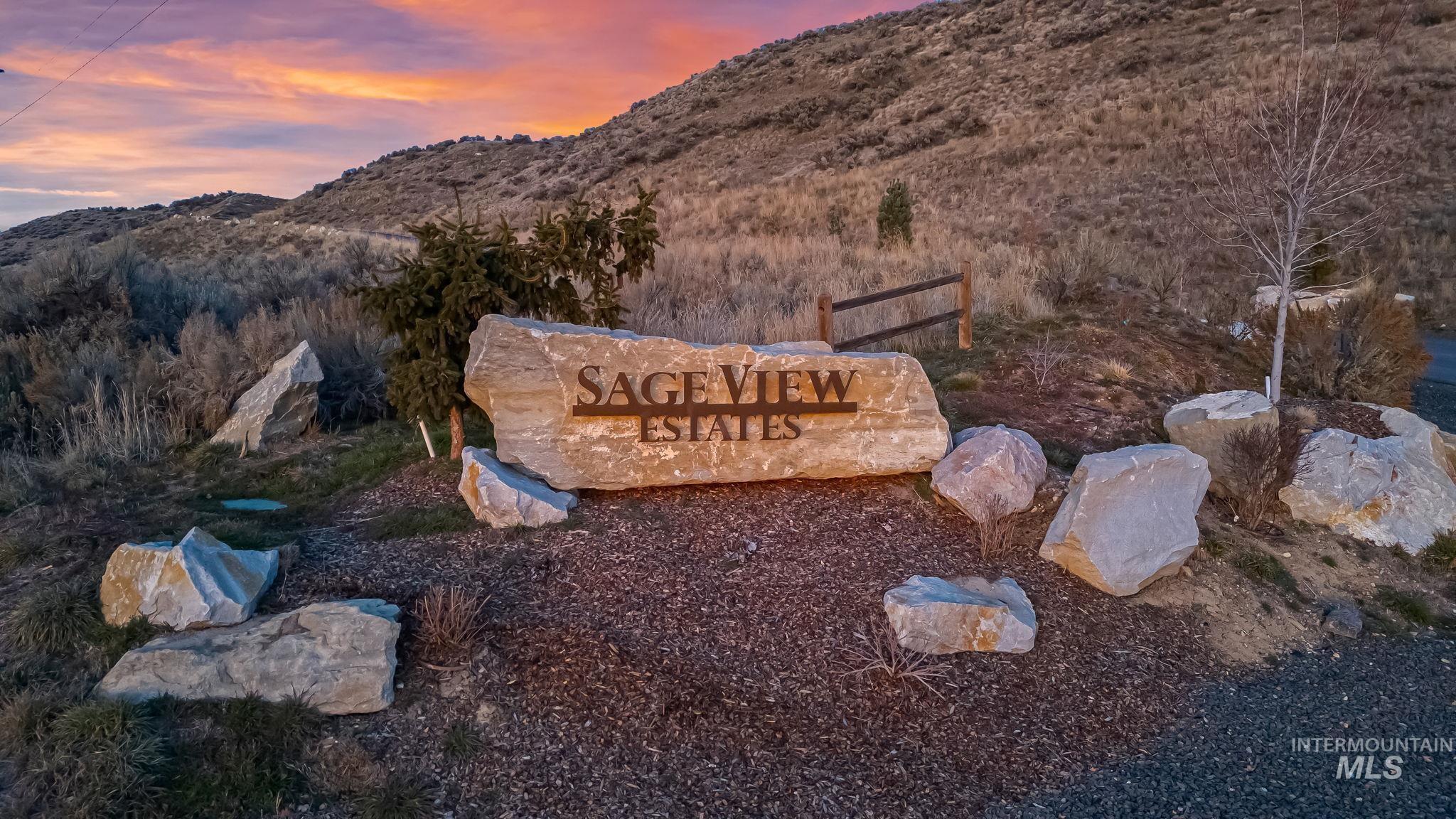 9799 North Springer Lane Eagle, ID 83616 - Photo 2 of 15 Community sign featuring a mountain view