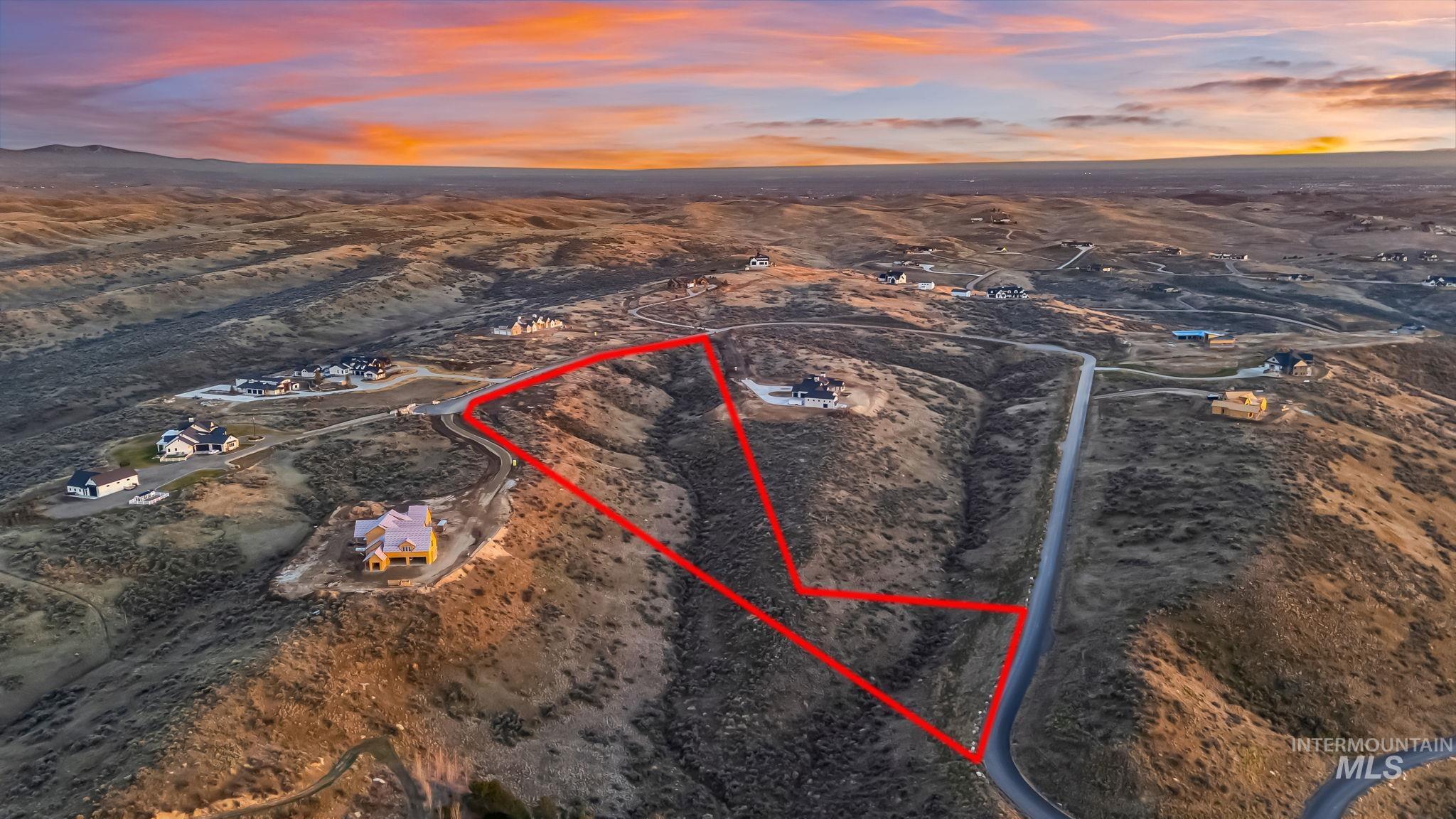 9799 North Springer Lane Eagle, ID 83616 - Photo 6 of 15 Drone / aerial view of a desert landscape and mountains