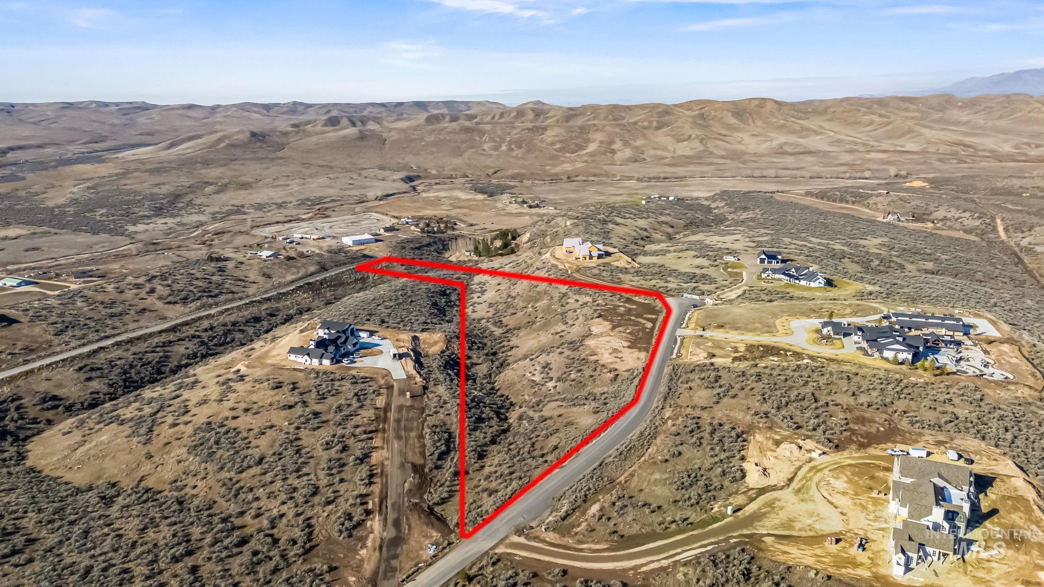 9799 North Springer Lane Eagle, ID 83616 - Photo 10 of 15 Aerial view of sparsely populated area with a desert landscape and property boundaries highlighted