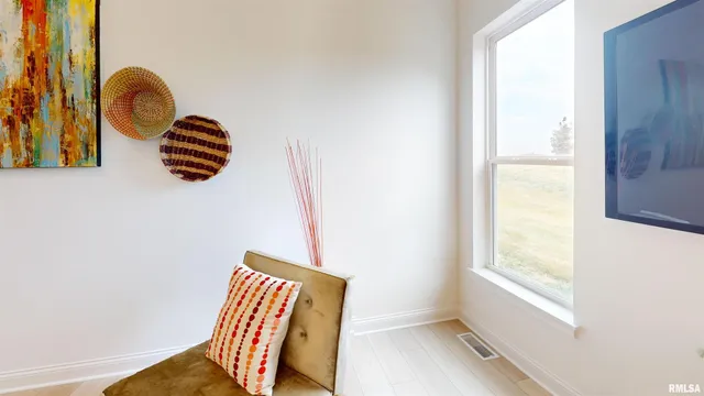 a view of staircase with wooden floor
