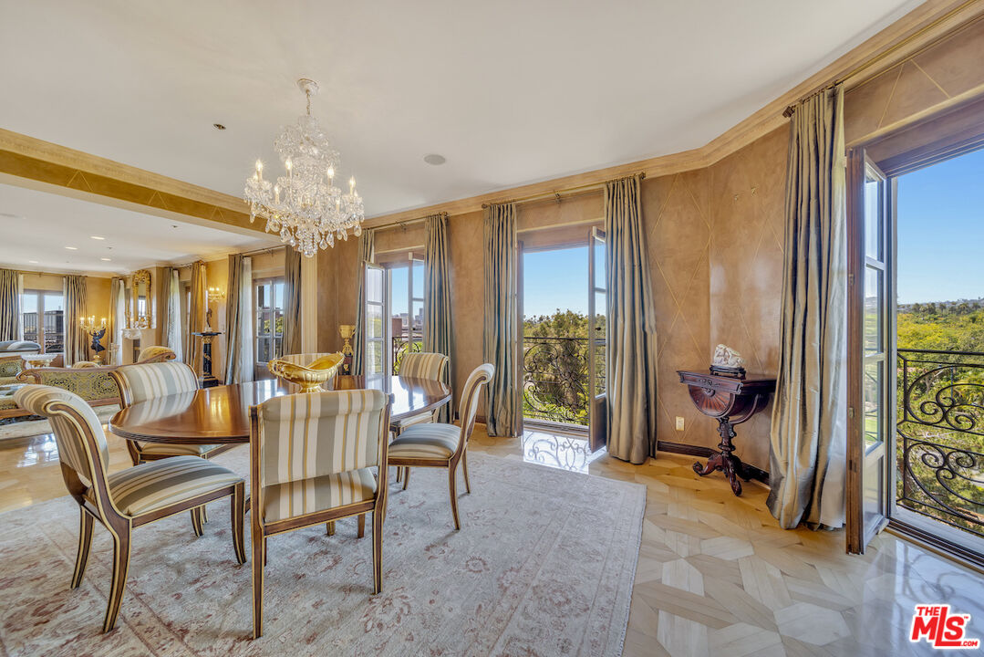 425 North Maple Drive, Unit PH 602 Beverly Hills, CA 90210 - Photo 12 of 37 a view of a room with furniture and a chandelier