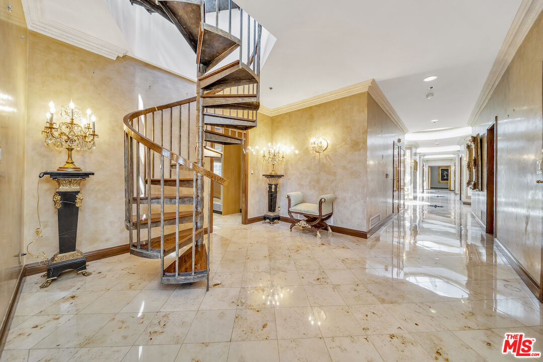 425 North Maple Drive, Unit PH 602 Beverly Hills, CA 90210 - Photo 17 of 37 a view of an entryway with a livingroom