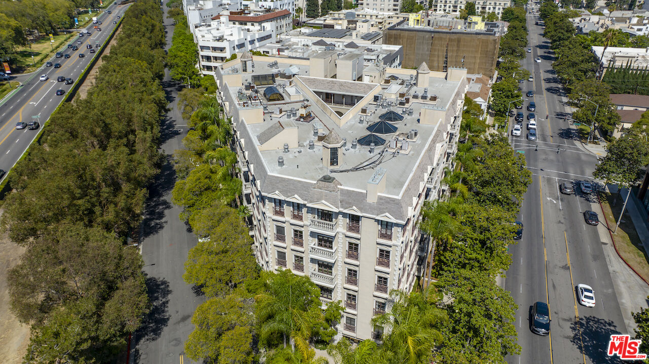 425 North Maple Drive, Unit PH 602 Beverly Hills, CA 90210 - Photo 18 of 37 a aerial view of a multi story building