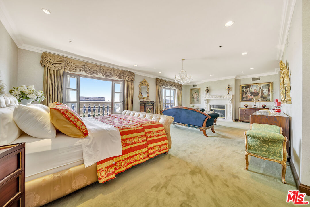 425 North Maple Drive, Unit PH 602 Beverly Hills, CA 90210 - Photo 25 of 37 a bedroom with bed and window