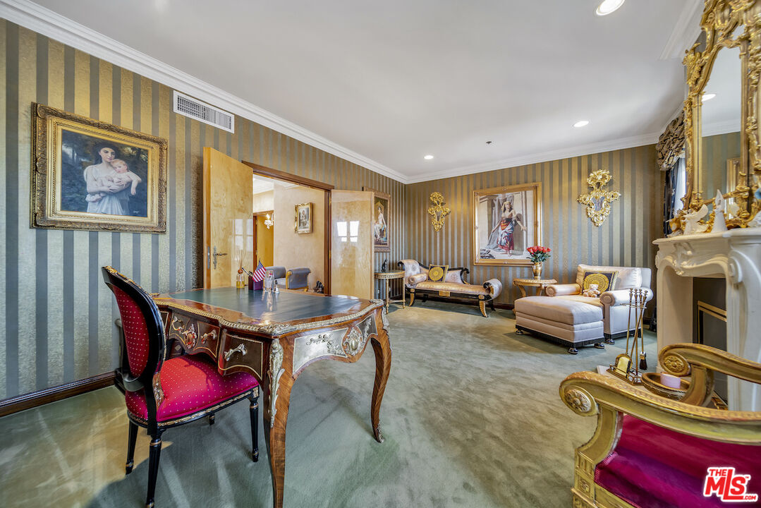 425 North Maple Drive, Unit PH 602 Beverly Hills, CA 90210 - Photo 30 of 37 a living room with furniture fireplace and rug