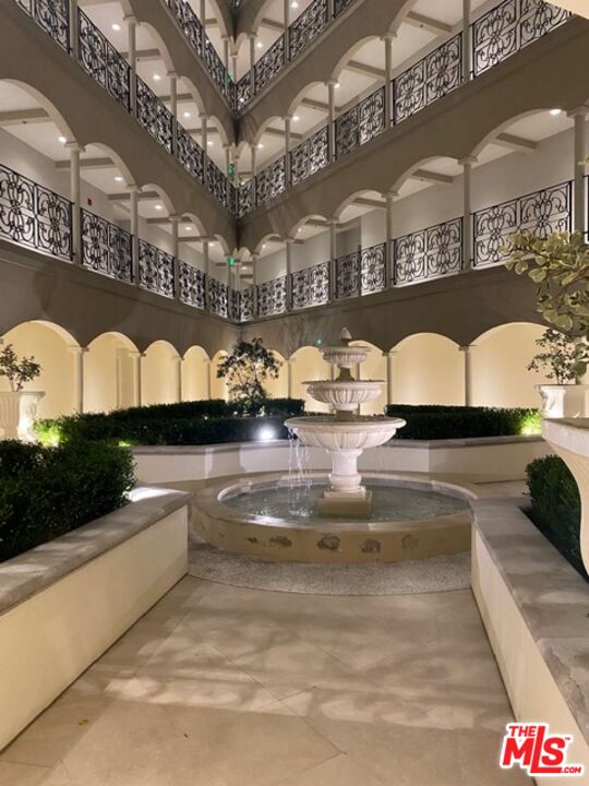 425 North Maple Drive, Unit PH 602 Beverly Hills, CA 90210 - Photo 34 of 37 a view of swimming pool with a couches and kitchen view