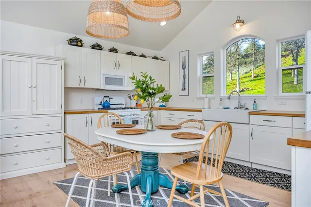 a dining room with furniture and window