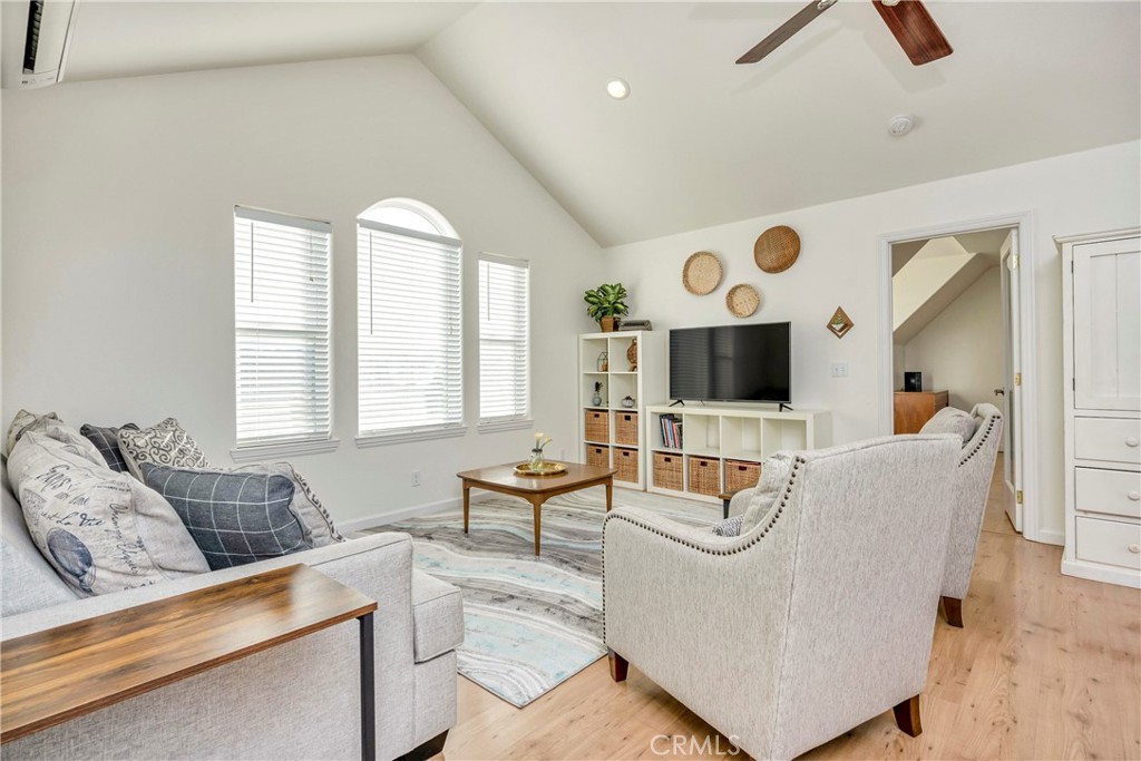 19618 Stinson Road Hidden Valley Lake, CA 95467 - Photo 6 of 17 a living room with furniture and a flat screen tv