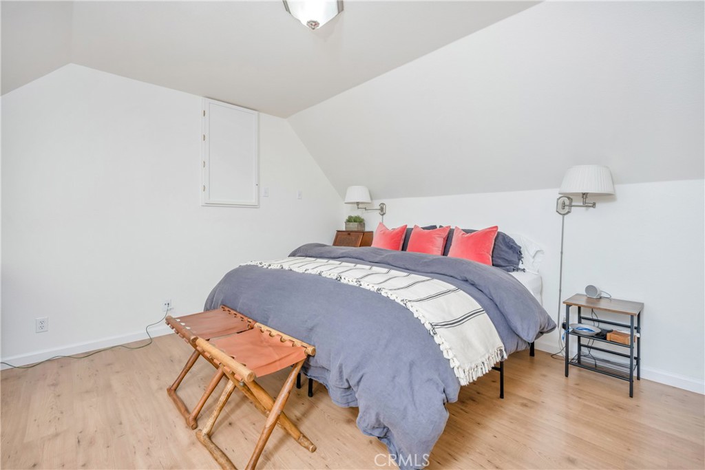 19618 Stinson Road Hidden Valley Lake, CA 95467 - Photo 8 of 17 a bedroom with a bed and a chair