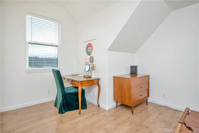 a room with furniture and a window