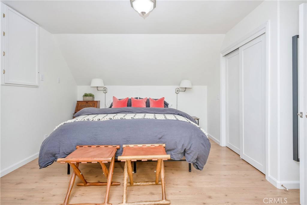 19618 Stinson Road Hidden Valley Lake, CA 95467 - Photo 10 of 17 a bedroom with a bed and chair