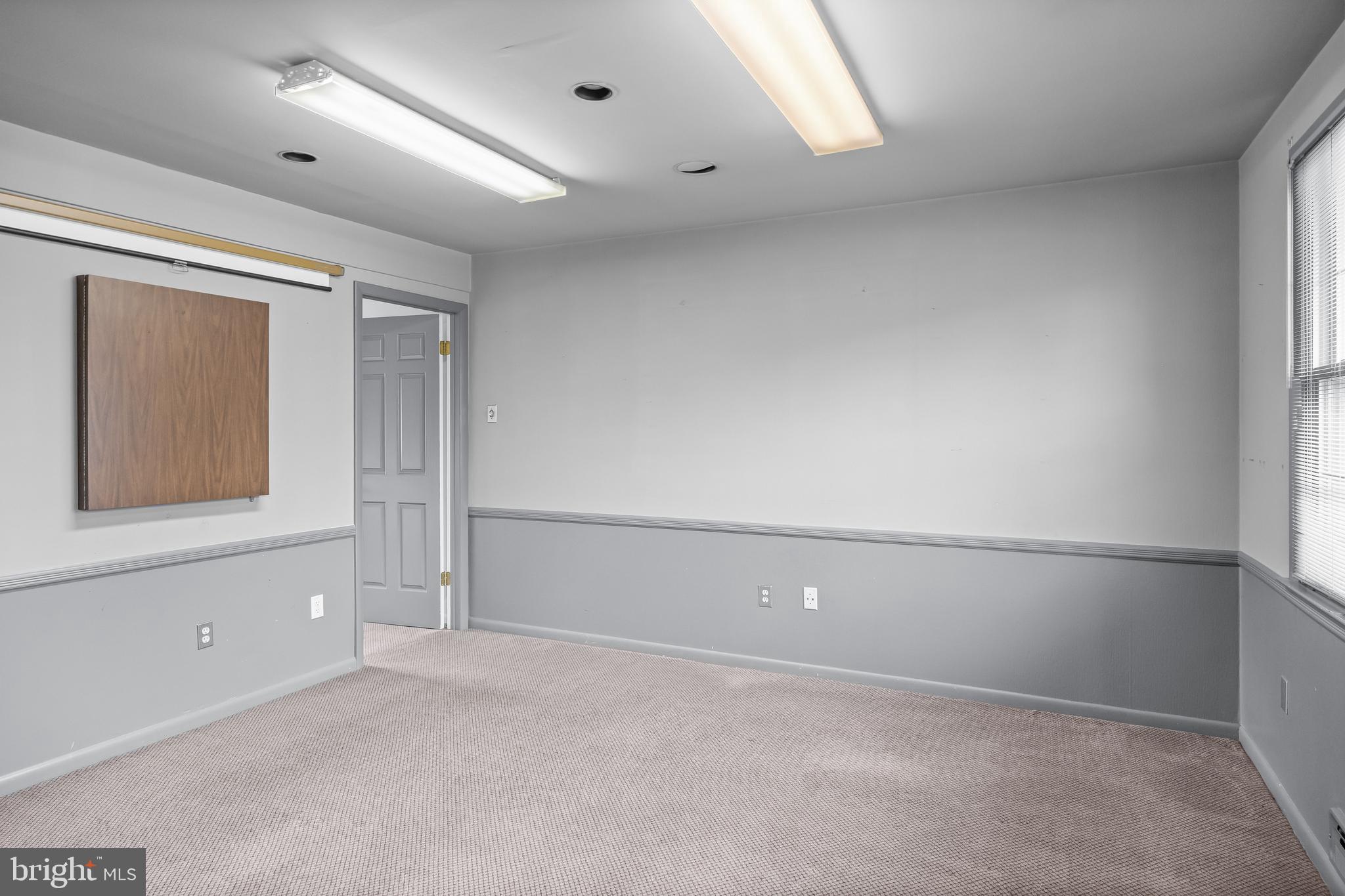 64 Warwick Road Stratford, NJ 08084 - Photo 12 of 28 an empty room with cabinet