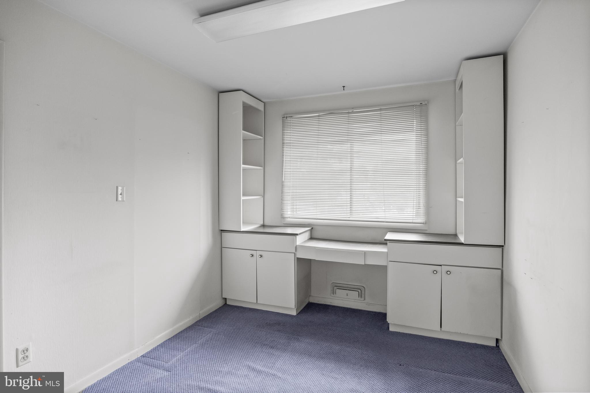 64 Warwick Road Stratford, NJ 08084 - Photo 14 of 28 a kitchen with a sink cabinets appliances and a window