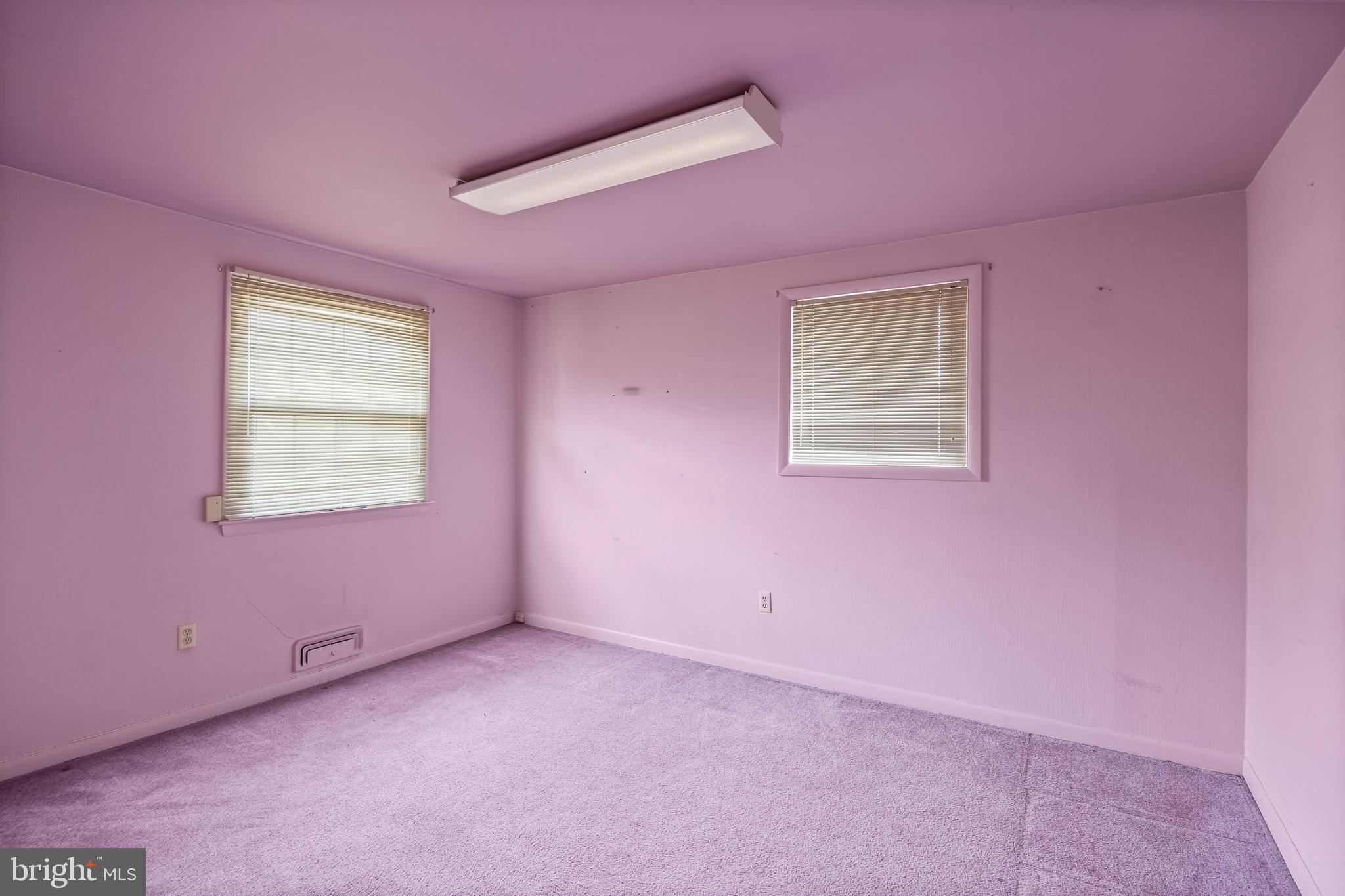 64 Warwick Road Stratford, NJ 08084 - Photo 22 of 28 a view of an empty room with a window