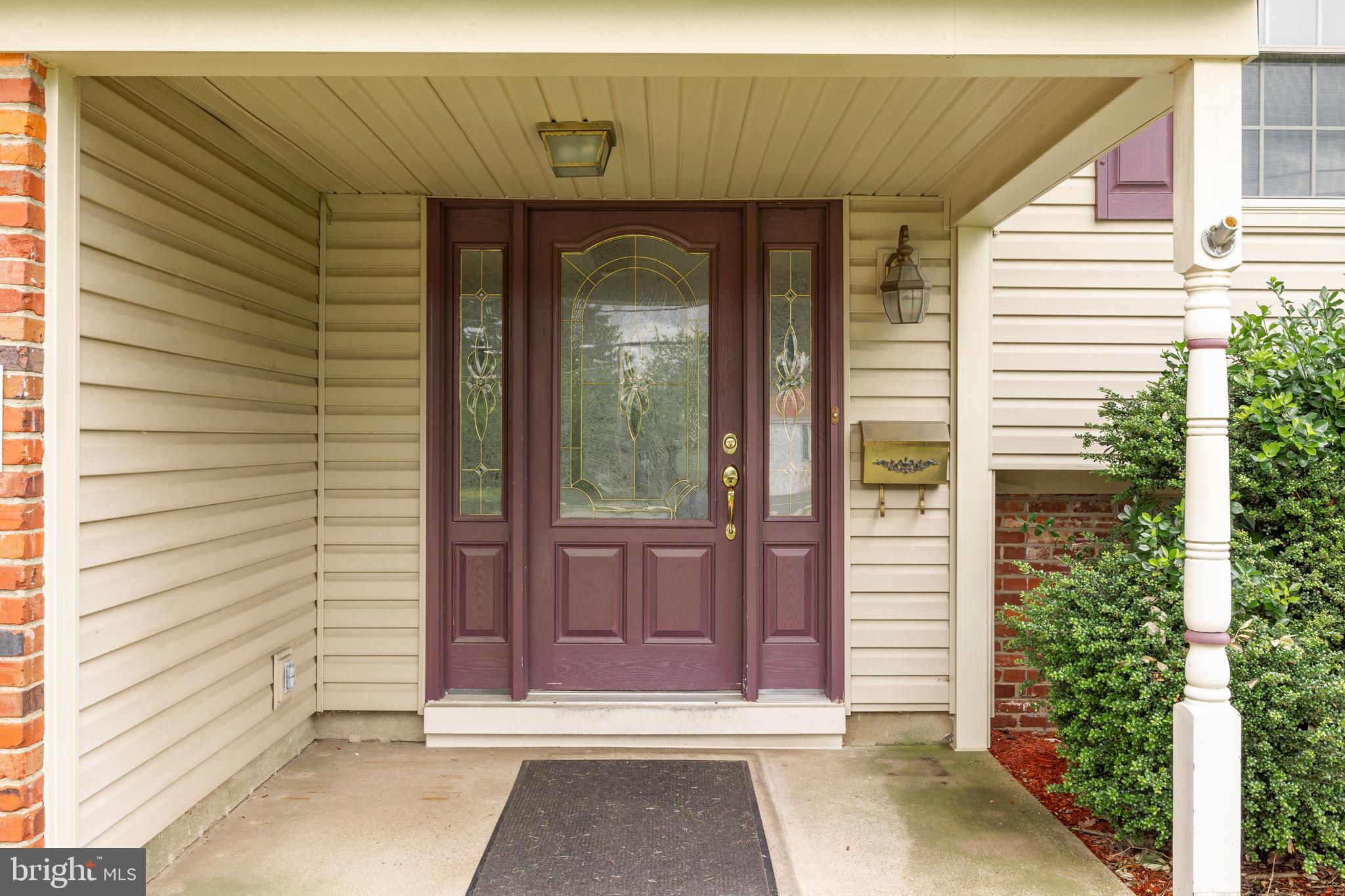 64 Warwick Road Stratford, NJ 08084 - Photo 4 of 28 a view of front door of house