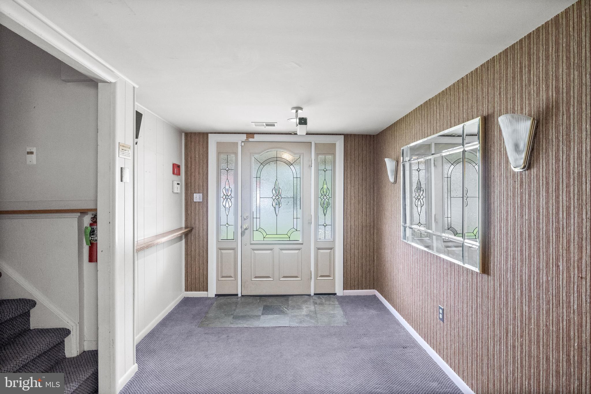 64 Warwick Road Stratford, NJ 08084 - Photo 6 of 28 a view of an empty room with a window