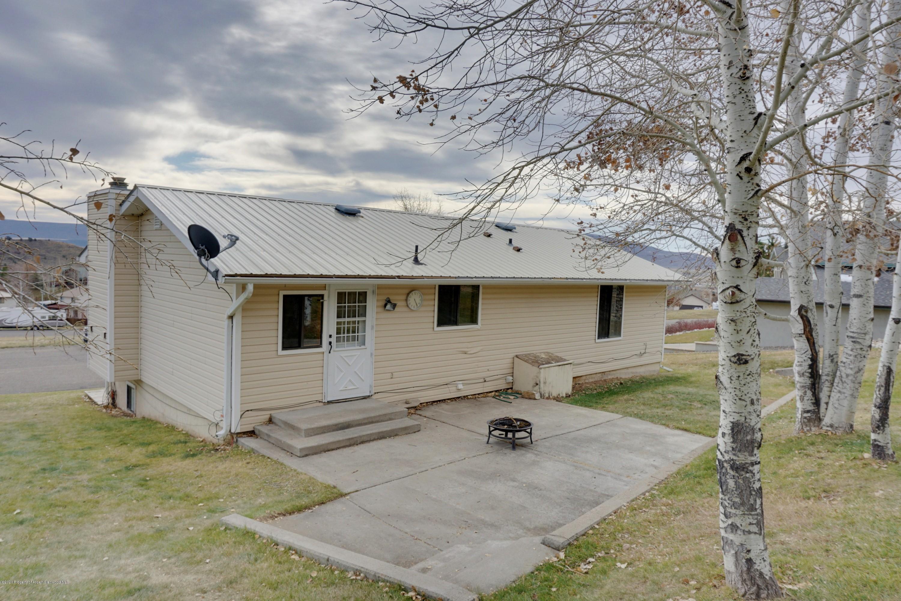 1409 Silver Sage Road Meeker, CO 81641 - Photo 24 of 26 a view of a house with a yard