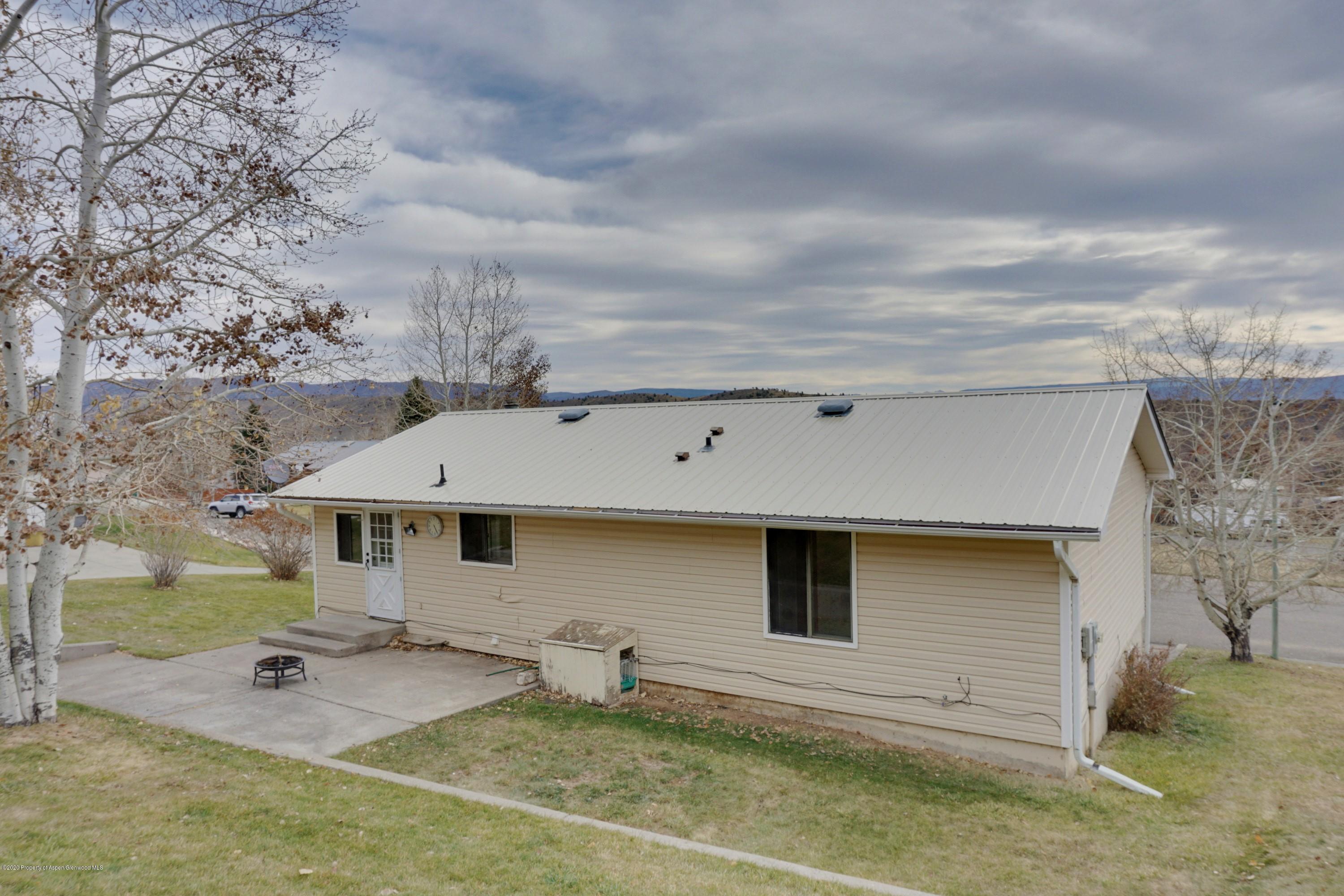 1409 Silver Sage Road Meeker, CO 81641 - Photo 26 of 26 an aerial view of a house with swimming pool