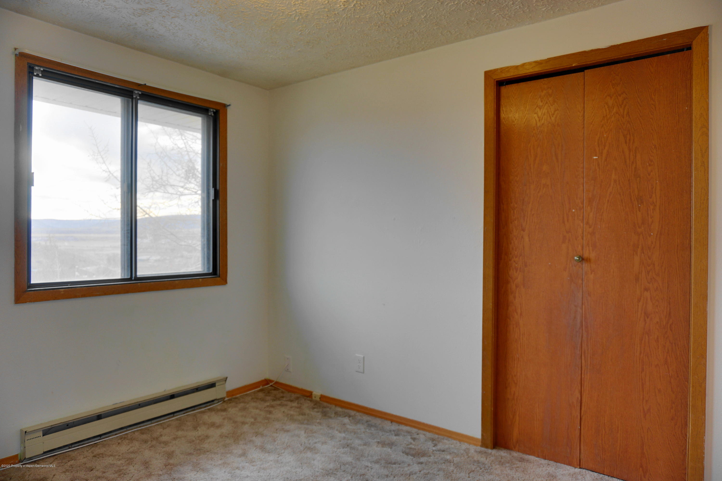 1409 Silver Sage Road Meeker, CO 81641 - Photo 10 of 26 an empty room with windows