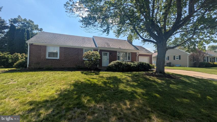 22 West Dale Road Wilmington, DE 19810 - Photo 1 of 24 Charming brick home with lush greenery.