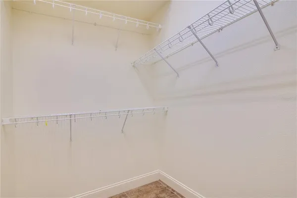 a view of a room with racks on the wall