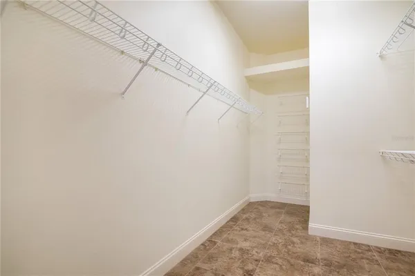 a view of a room with racks on the wall
