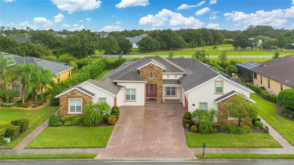 6510 Eagle Ridge Way Lakeland, FL 33813 - Photo 2 of 50 a view of a big yard in front of the house