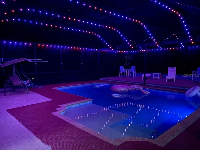 a view of a patio with swimming pool