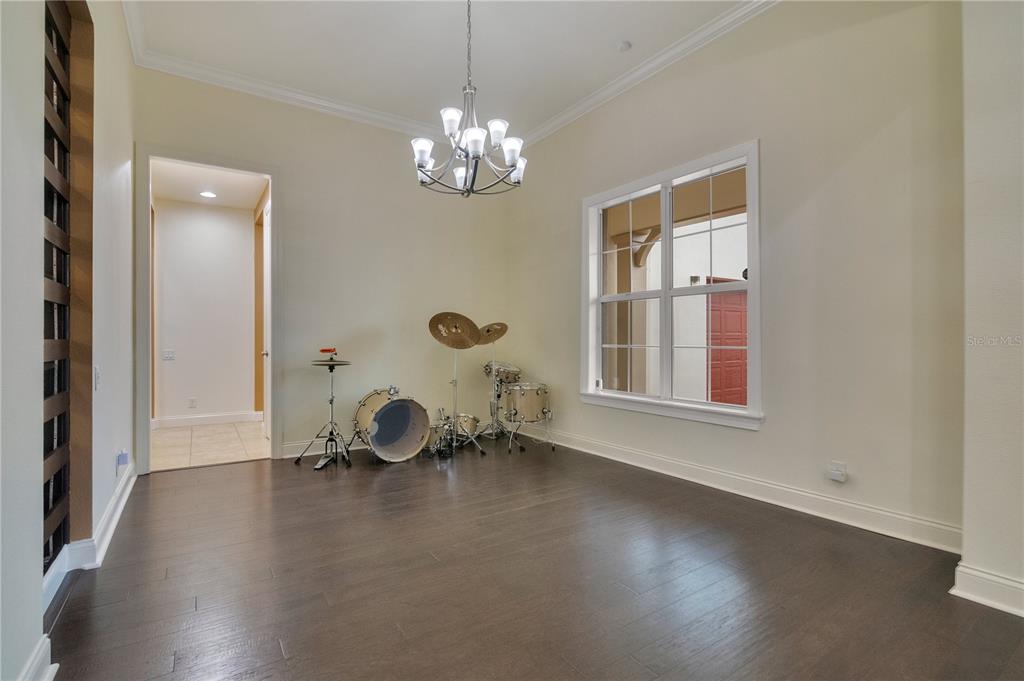6510 Eagle Ridge Way Lakeland, FL 33813 - Photo 8 of 50 a view of a room with windows and chandelier