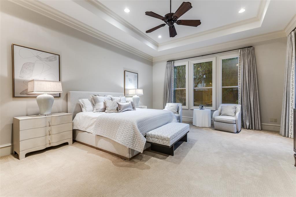 6031 Azalea Lane Dallas, TX 75230 - Photo 14 of 38 a spacious bedroom with a bed couch and window