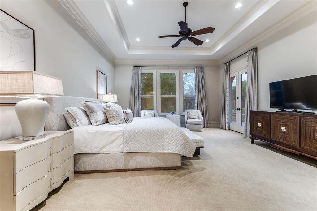 6031 Azalea Lane Dallas, TX 75230 - Photo 15 of 38 a bedroom with bed tv and window