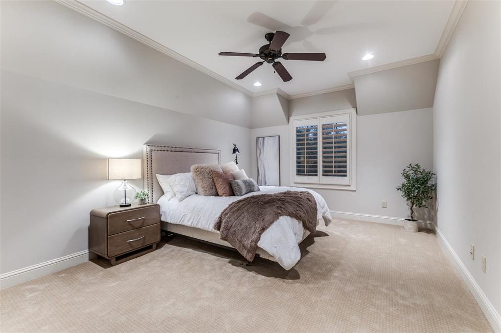 6031 Azalea Lane Dallas, TX 75230 - Photo 20 of 38 a bedroom with a bed and window