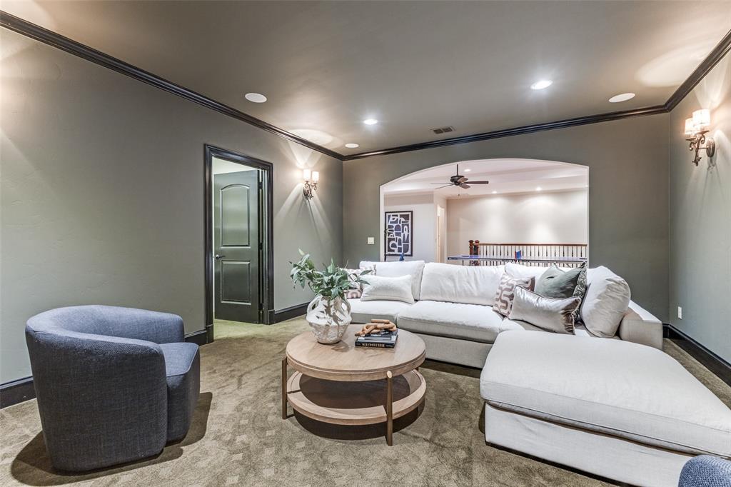6031 Azalea Lane Dallas, TX 75230 - Photo 24 of 38 a living room with furniture and a large window
