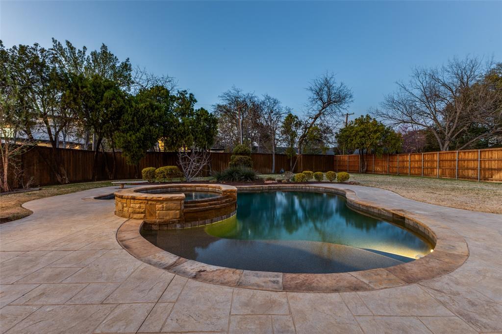 6031 Azalea Lane Dallas, TX 75230 - Photo 32 of 38 a view of a swimming pool with outdoor seating