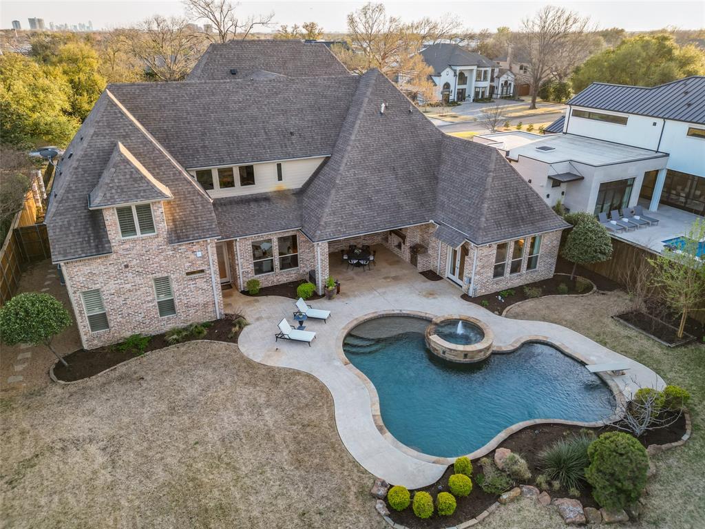 6031 Azalea Lane Dallas, TX 75230 - Photo 36 of 38 an aerial view of a house with garden space and street view