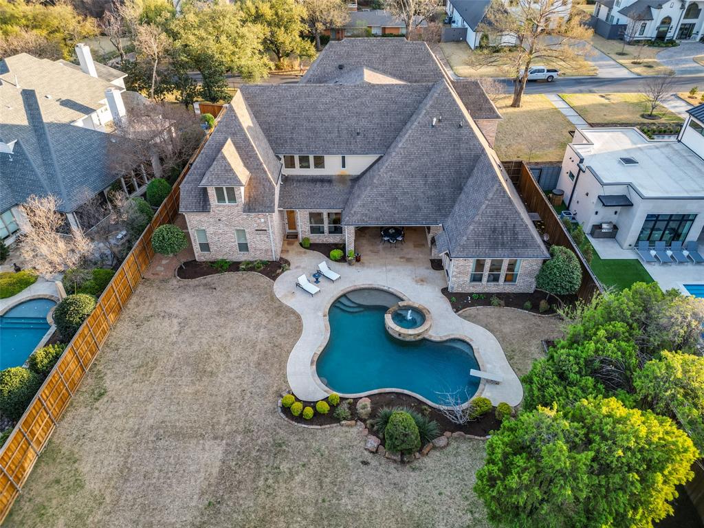 6031 Azalea Lane Dallas, TX 75230 - Photo 37 of 38 an aerial view of a house with garden space and street view