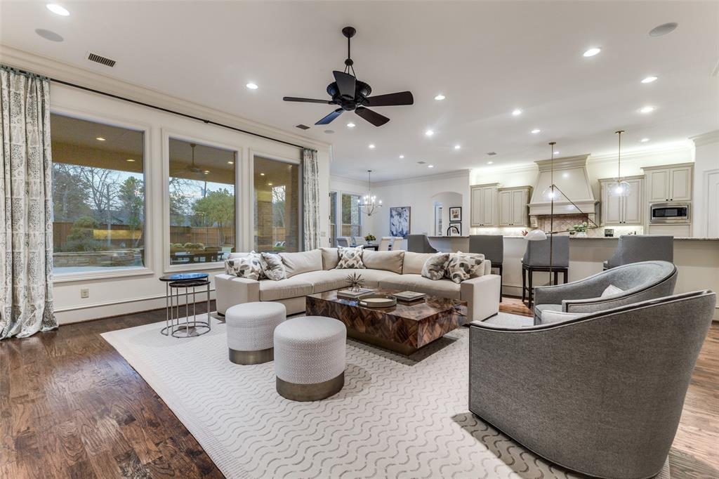6031 Azalea Lane Dallas, TX 75230 - Photo 5 of 38 a living room with furniture a window and a chandelier