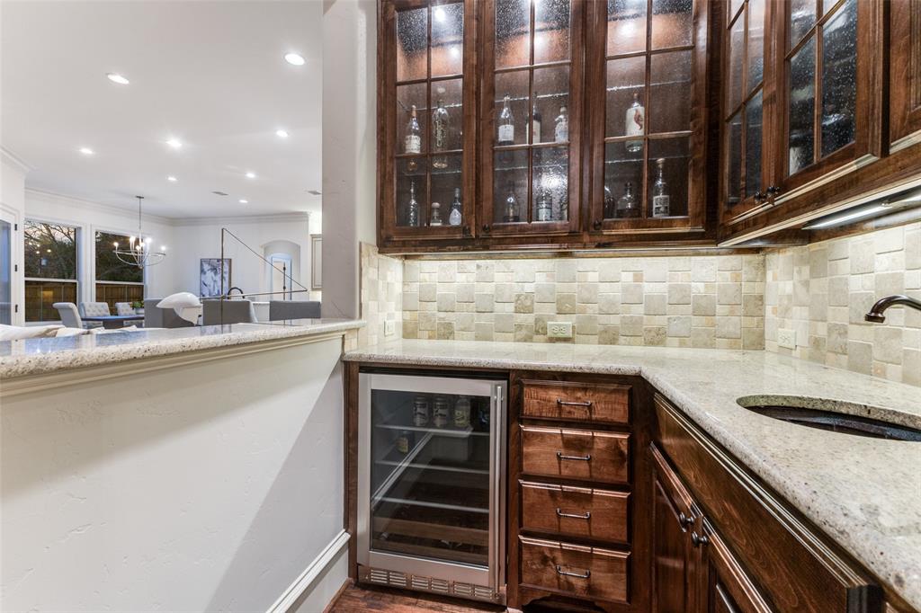 6031 Azalea Lane Dallas, TX 75230 - Photo 8 of 38 a kitchen with a sink and cabinets