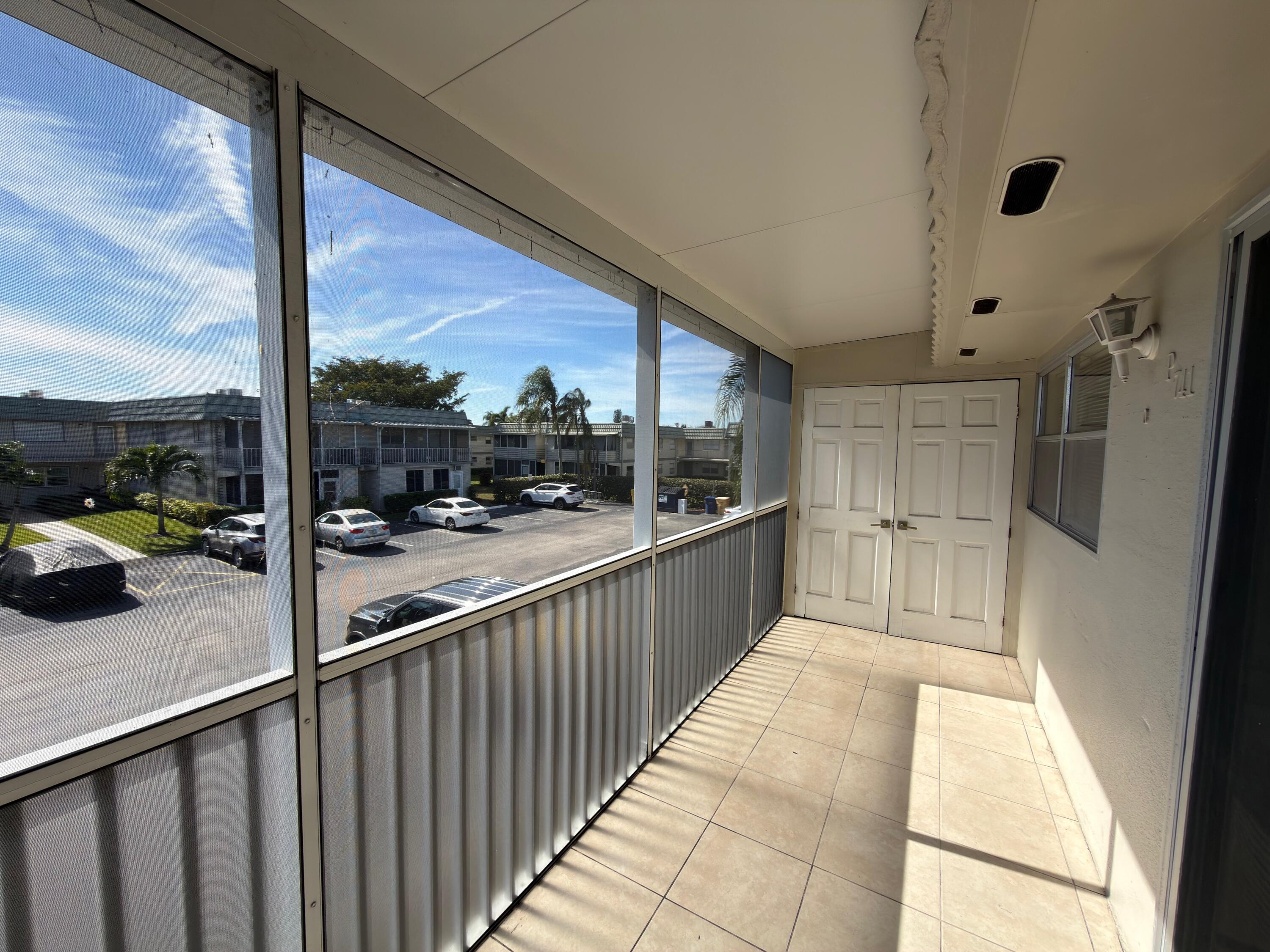 741 Monaco P, Unit 741 Delray Beach, FL 33446 - Photo 17 of 18 a view of a balcony